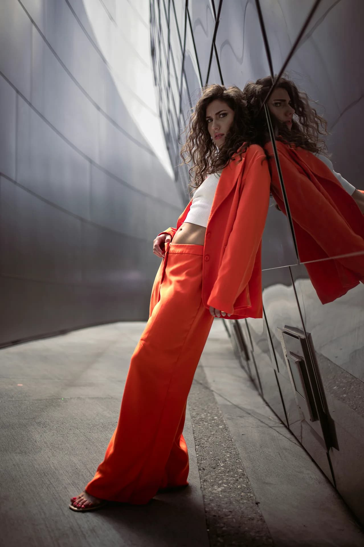 A fashion image shaped by city movement and editorial posture.