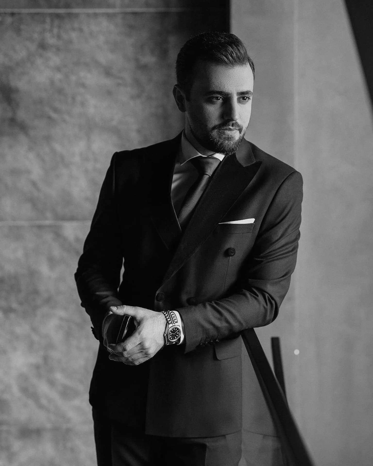 A fashion photograph focused on garment shape and attitude.